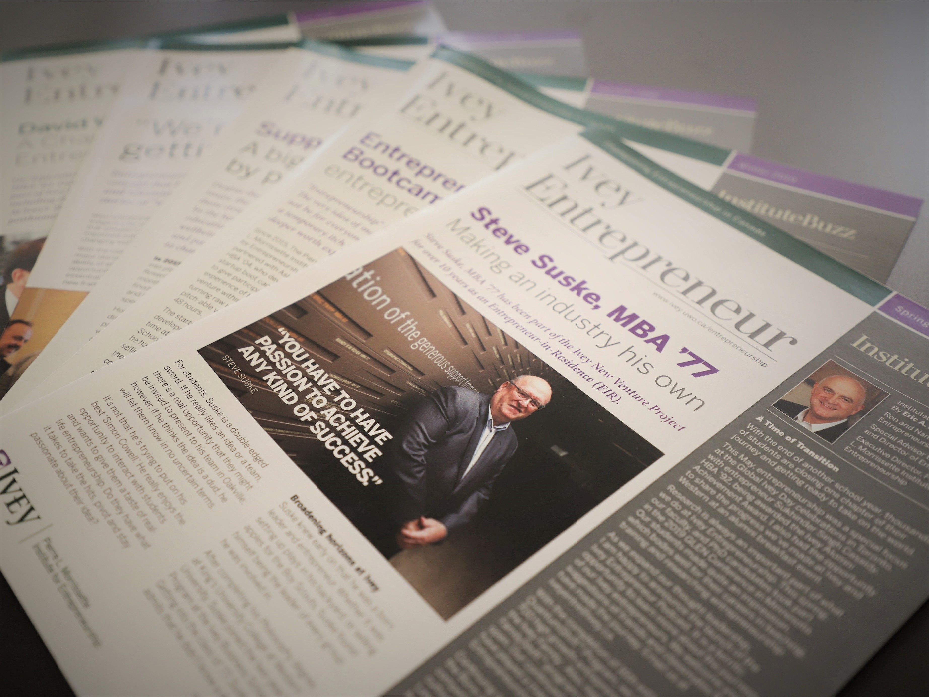 Image of newsletters stacked on a table